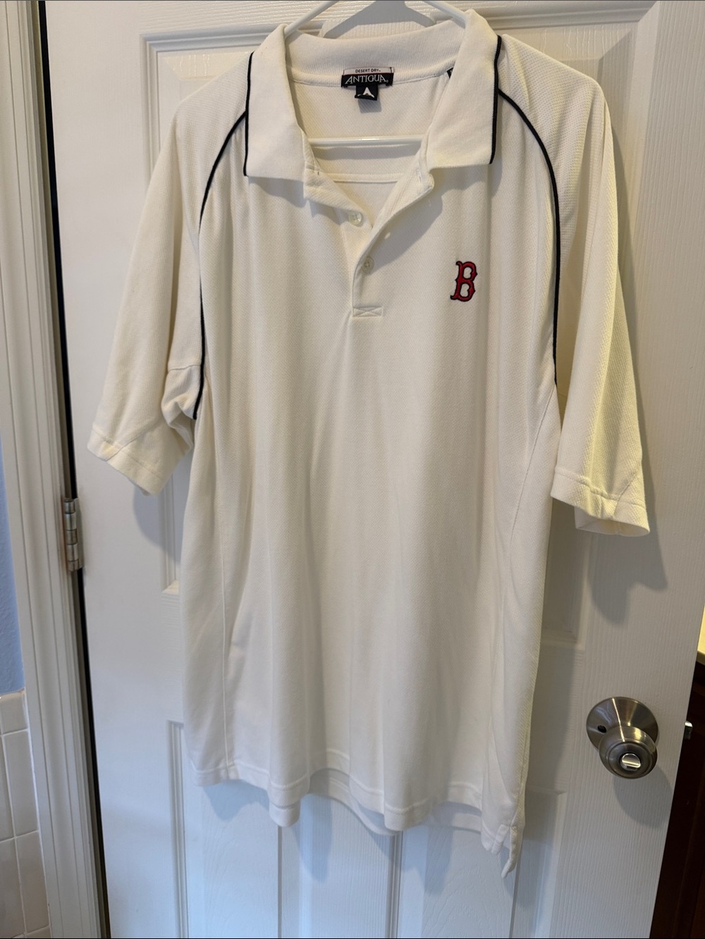 Antigua White Polo with Red 'B' Crest and Black Piping